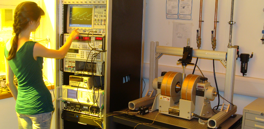 Summer student Lucy Cunningham measuring reflected microwave power